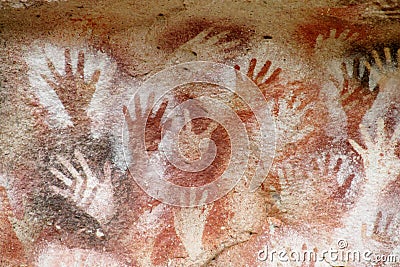 Hand prints on a cave wall cueva de las manos Stock Photo