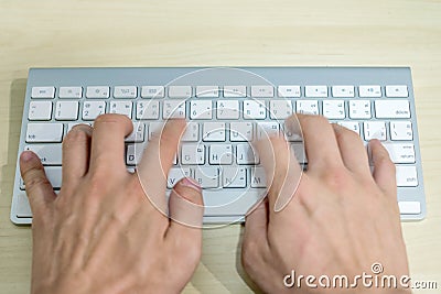 Hand professional programmer typewriting on modern keyboard on w Stock Photo