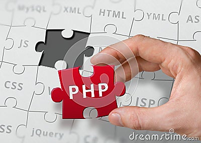 Hand of programmer holds puzzle with PHP programming language Stock Photo