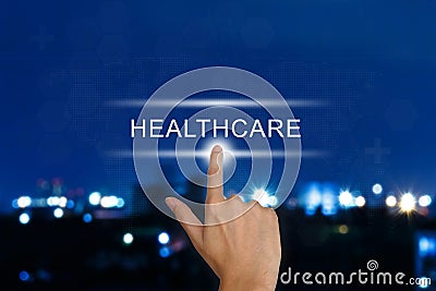 Hand pushing healthcare button on touch screen Stock Photo