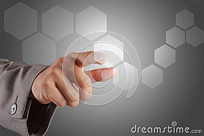 Hand pushing on a virtual touch screen interface Stock Photo