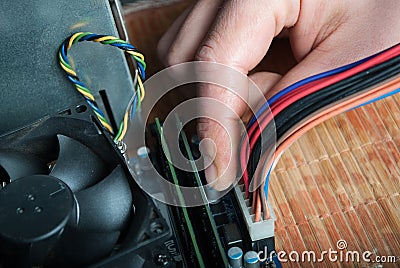 Hand Connecting Power Cable to Computer Motherboard: Technology Concept Image Cartoon Illustration