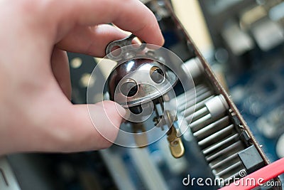 Hand put robot in computer Stock Photo