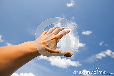 Hand reach for the sky Stock Photo