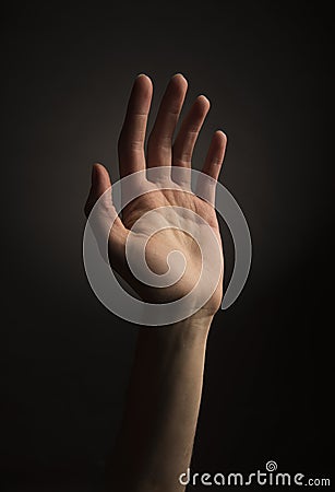 Hand Reaching Up Stock Photo