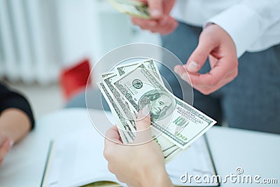 Hand receiving money from businessman. Stock Photo