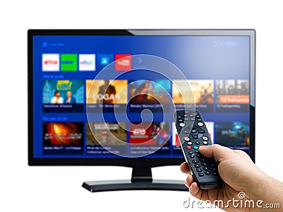 Hand remote controller pointing at internet or on demand tv display Stock Photo