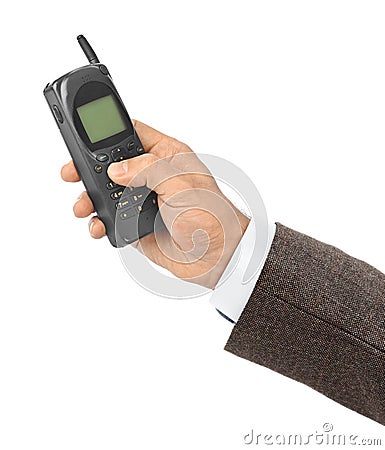 Hand with retro mobile phone Stock Photo