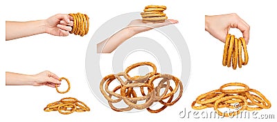 Hand with round dryed bagels, fast food snacks, set and collection Stock Photo