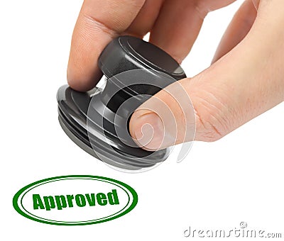 Hand and rubber stamp Approved Stock Photo