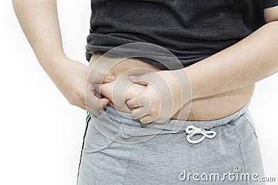 Hand`s man touching his fat belly skin Stock Photo