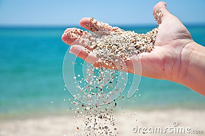 Hand with sand Stock Photo