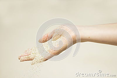 Hand with sand Stock Photo