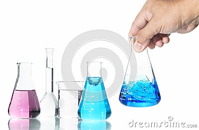 Hand scientist shaking Erlenmeyer flask with blue liquid isolated on white Stock Photo