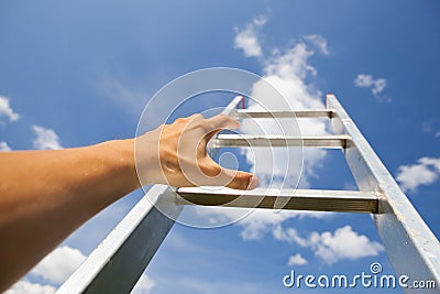 Hand scrambling by stairs Stock Photo