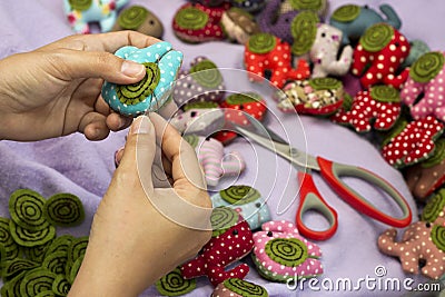 Hand sewing and cloth dolls Stock Photo