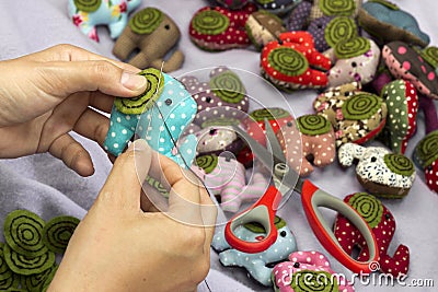 Hand sewing elephant cloth dolls Stock Photo