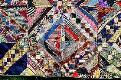 Closeup Hand-stitched heirloom quilt Stock Photo