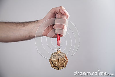 Hand showing medal. Sport, Winner, Success Stock Photo