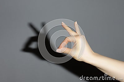 The hand shows a shadow rabbit Stock Photo