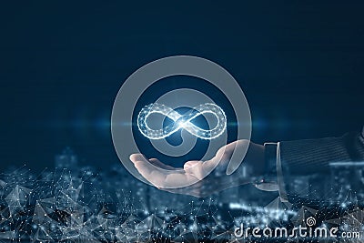 Hand shows the sign of infinity on the background of the city Stock Photo
