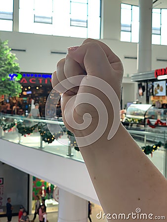 Hand sign in the mall background Stock Photo