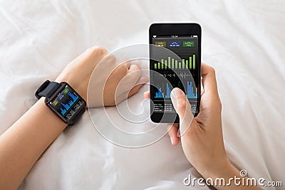 Hand With Smart Watch Showing Heart Beat Rate Stock Photo