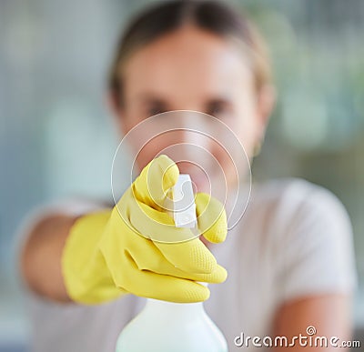 Hand, spray bottle and cleaning with a woman in gloves for housework or sanitization for hygiene. Hands, latex and Stock Photo