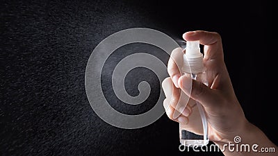 Hand with sprayer Stock Photo