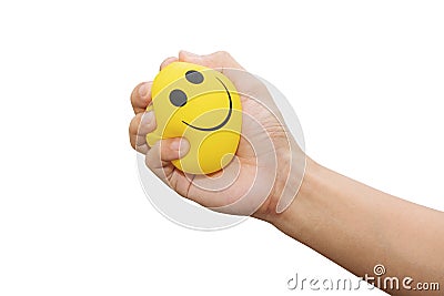 Hand squeeze yellow stress ball, isolated on white background, anger management, positive thinking concepts Stock Photo