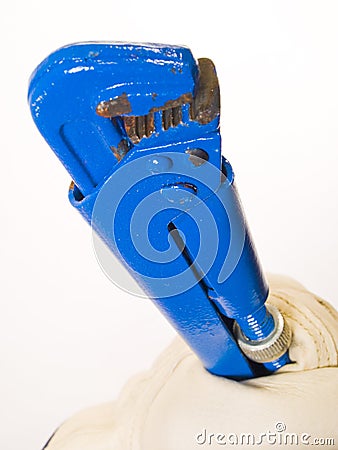Hand squeezing blue tool Stock Photo