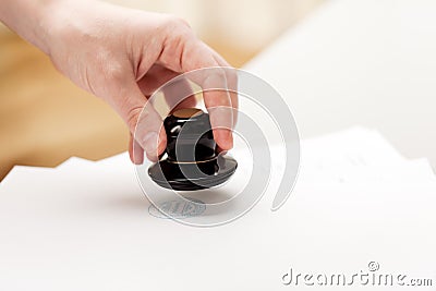 Hand stamp paper document Stock Photo