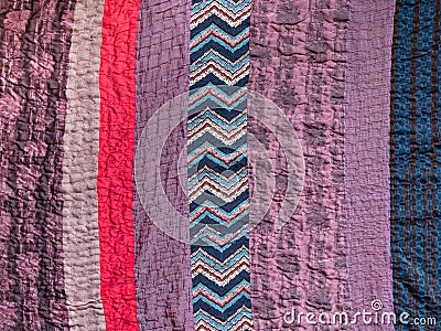 hand stitched patchwork cloth from fabric stripes Stock Photo