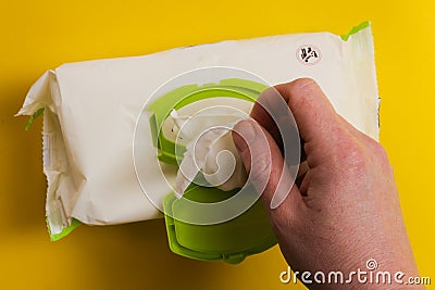 Hand taking baby wipes Stock Photo