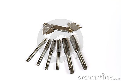 Hand tap threading tool with thread gauge. Stock Photo