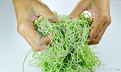 Hand thresh raw Chinese jade noodle prepare to cook Stock Photo
