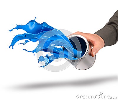 Hand throwing blue paint from can Stock Photo