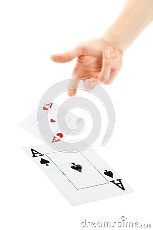 Hand throwing cards Stock Photo