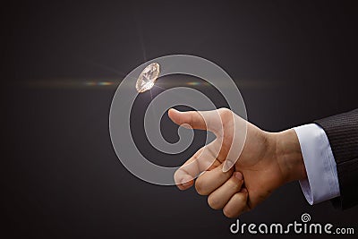 Hand throws a coin. Stock Photo