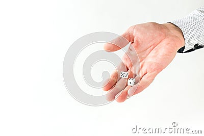 Hand throws dice on white background Stock Photo