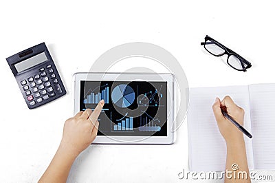 Hand touching business chart on tablet Stock Photo