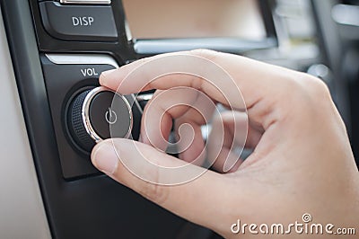 Hand tuning fm radio button Stock Photo