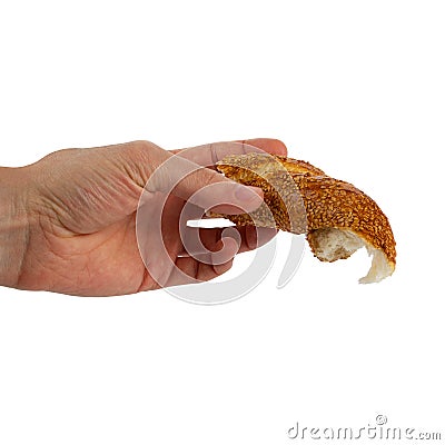 Hand Turkish traditional sesame bagel white background Stock Photo