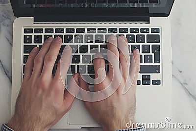 Hand typing on keyboard notebook Stock Photo