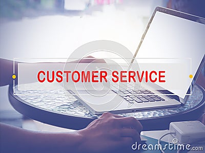Hand Typing on keyboard with text CUSTOMER SERVICE Stock Photo