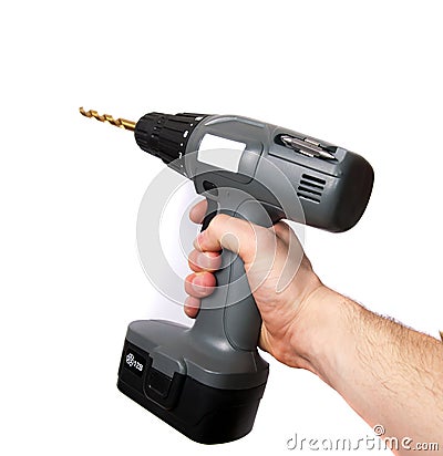 Hand using a drill Stock Photo