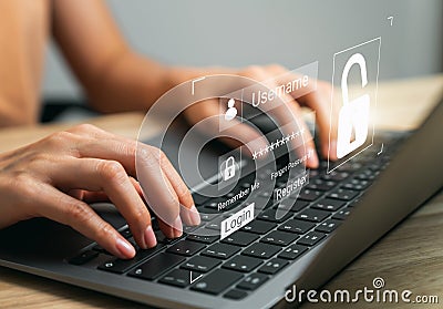 Hand using laptop and type your username and password to access the system, login screen, private data and prevent identity Stock Photo