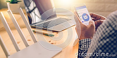 Hand using smart phone with Social media concept Stock Photo