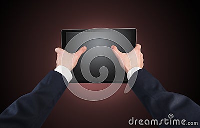 Hand using tablet with copy space Stock Photo
