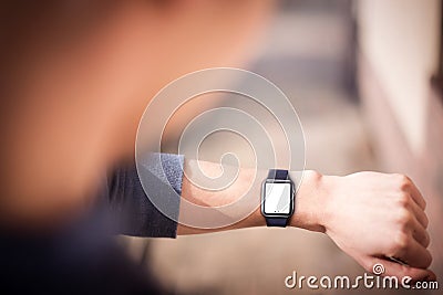 Hand wearing smartwatch Stock Photo